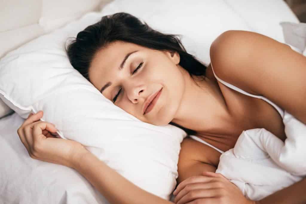 Women Sleeping after installing Night Guard